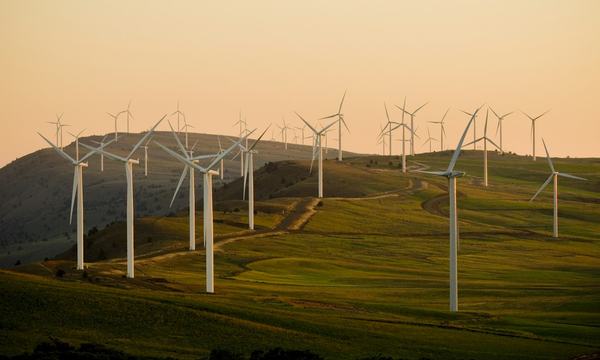 Wind turbines on a green field