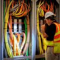 Building inspector checking electrical services
