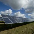 Solar panels on a green field