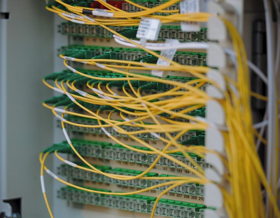 Network cables neatly connected in a server rack